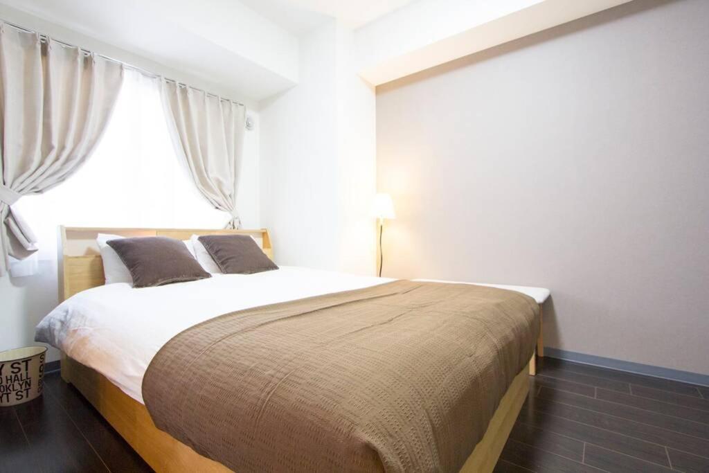 ようこそ札幌へ! 大通公園まで地下鉄10分 定員6名 Firetv完備 1階はセコマ Apartment Bagian luar foto