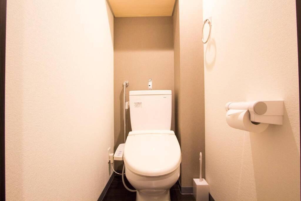 ようこそ札幌へ! 大通公園まで地下鉄10分 定員6名 Firetv完備 1階はセコマ Apartment Bagian luar foto