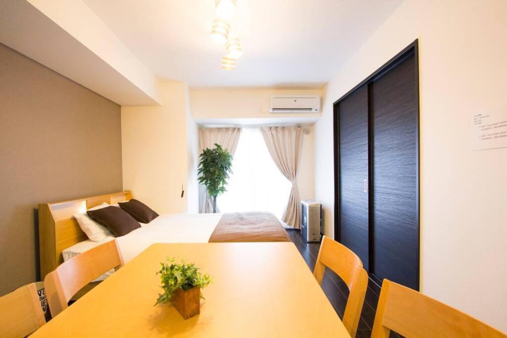 ようこそ札幌へ! 大通公園まで地下鉄10分 定員6名 Firetv完備 1階はセコマ Apartment Bagian luar foto