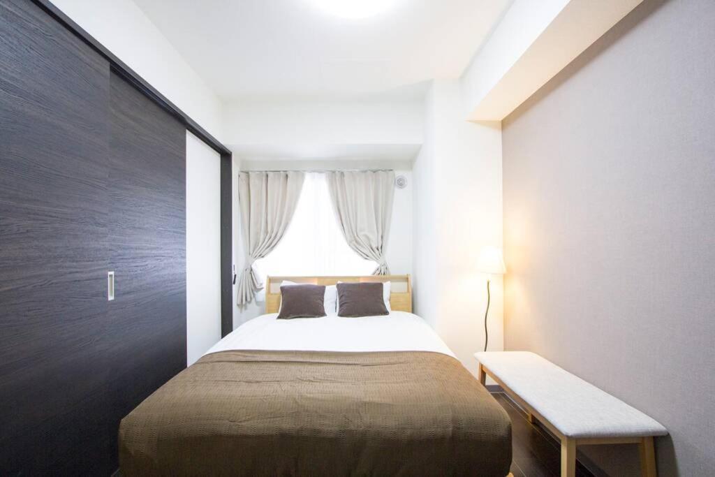 ようこそ札幌へ! 大通公園まで地下鉄10分 定員6名 Firetv完備 1階はセコマ Apartment Bagian luar foto