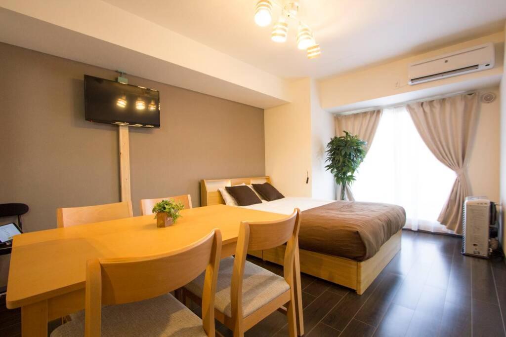 ようこそ札幌へ! 大通公園まで地下鉄10分 定員6名 Firetv完備 1階はセコマ Apartment Bagian luar foto